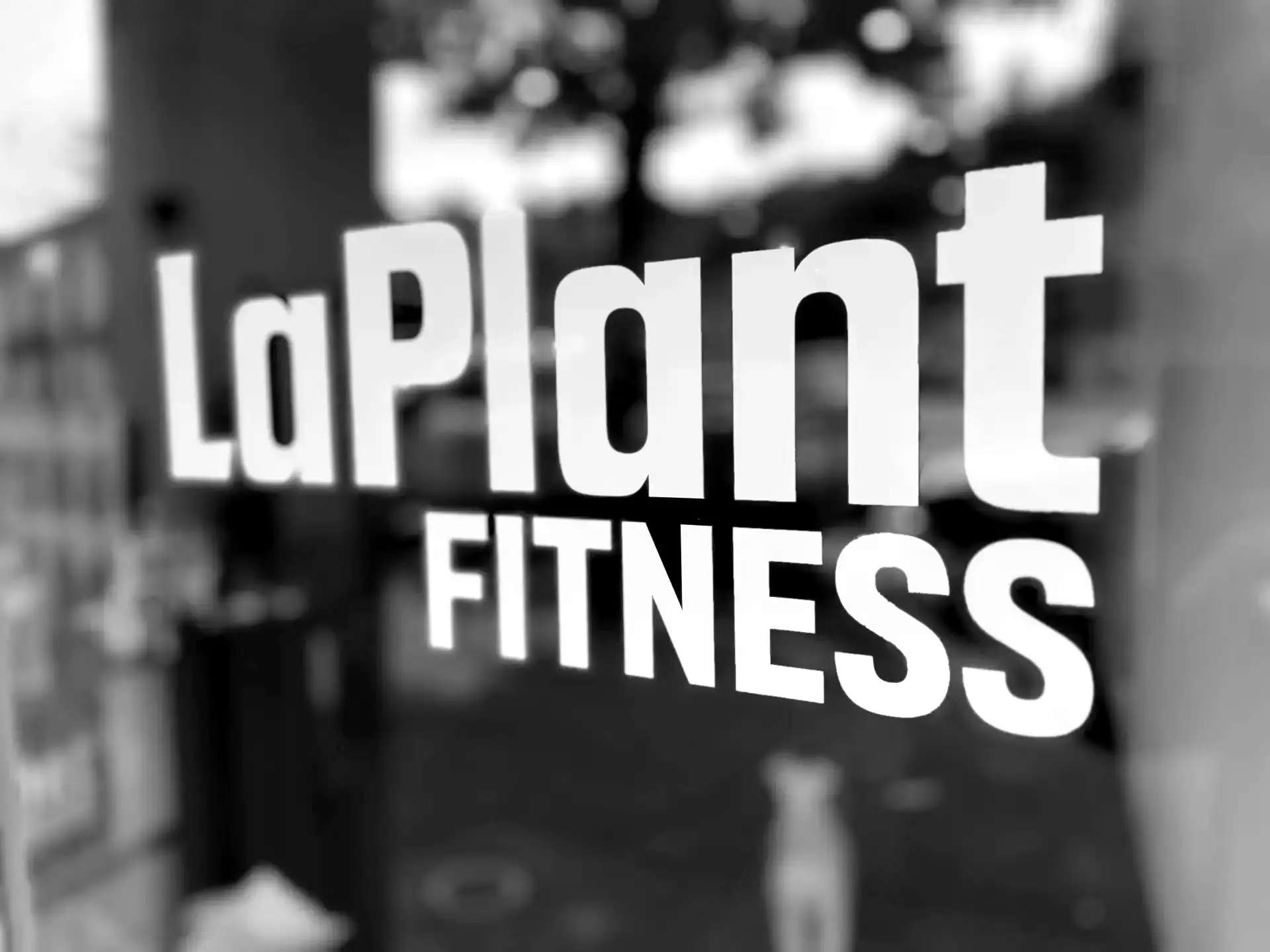 LaPlant Fitness Personal Training Studio Front entrance door of LaPlant Fitness in Marin, CA, featuring the company logo and welcoming clients to a private one-on-one personal training experience.